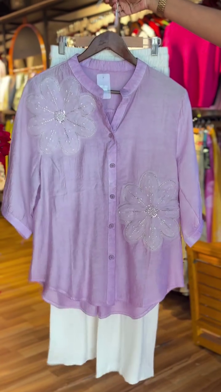 Elegant Off-White Wide-Leg Pants with Minimal Button Detail