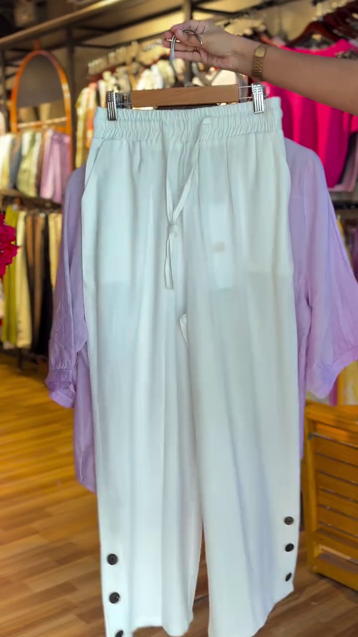 Elegant Off-White Wide-Leg Pants with Minimal Button Detail