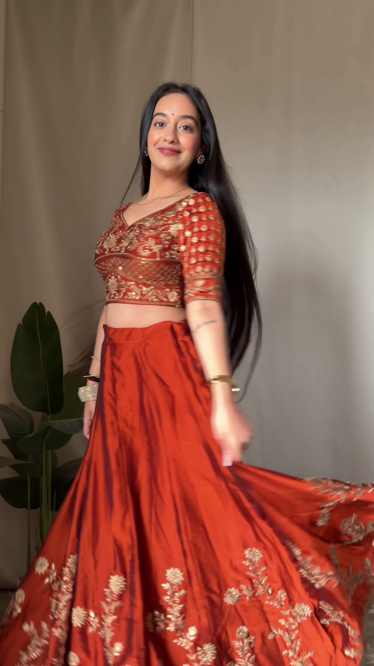 Regal Rust Embroidered Lehenga Set with Golden Detailing