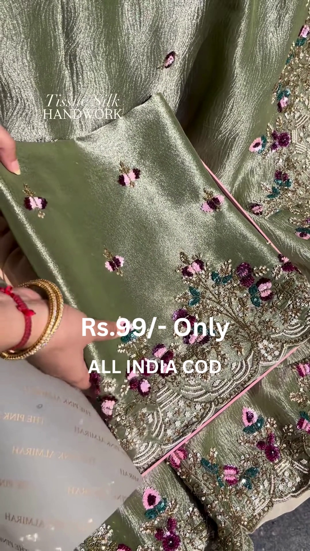 Luxurious Green Tissue Silk Suit with Intricate Floral Handwork Design