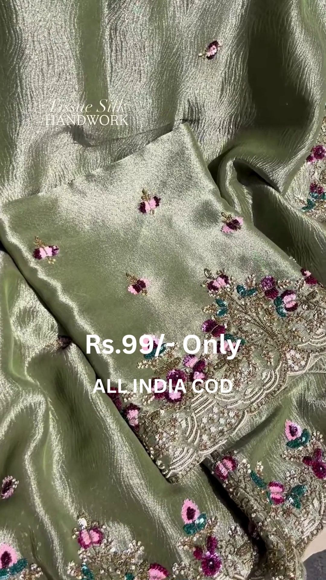 Luxurious Green Tissue Silk Suit with Intricate Floral Handwork Design