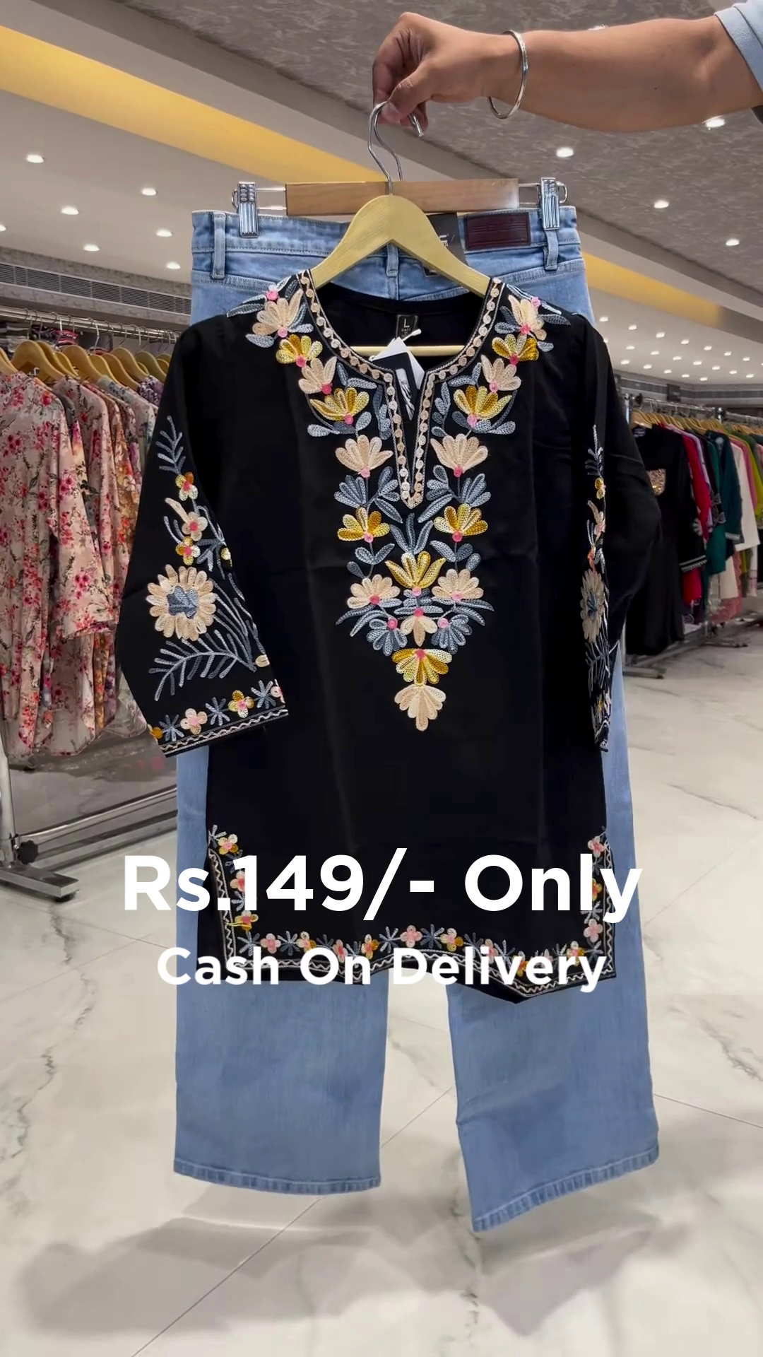 Trendy Black Embroidered Kurti Paired with Denim for a Chic Indo-Western Look