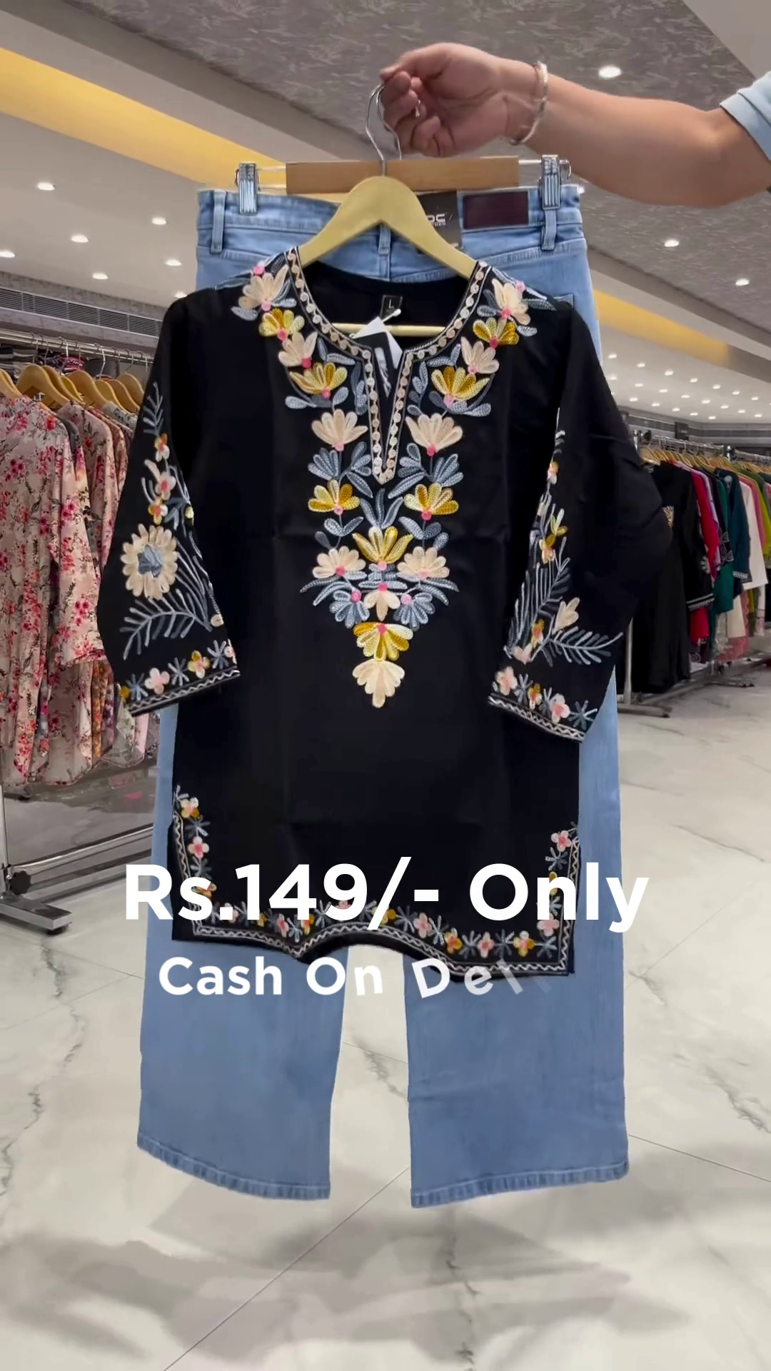 Trendy Black Embroidered Kurti Paired with Denim for a Chic Indo-Western Look