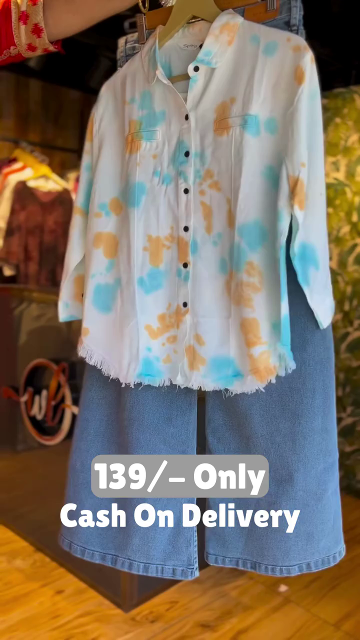 Trendy Tie-Dye Shirt with Denim Shorts – Casual Cool Combo