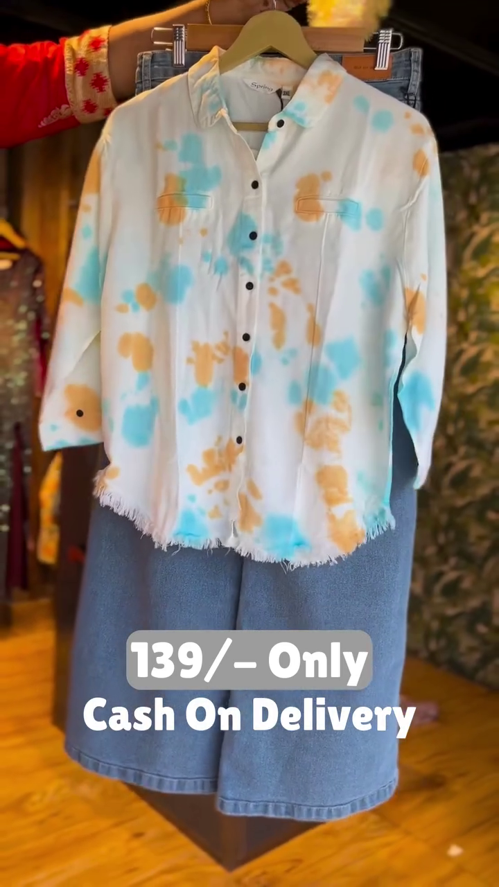 Trendy Tie-Dye Shirt with Denim Shorts – Casual Cool Combo