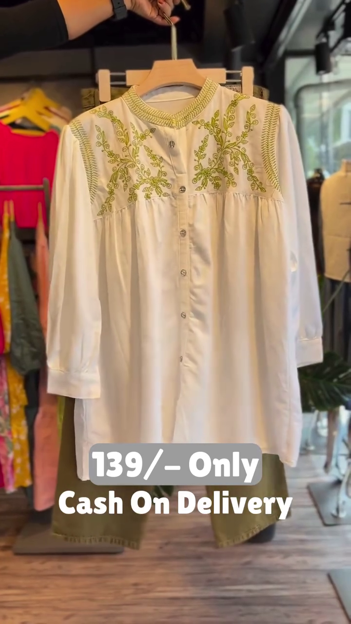 Classic White Embroidered Kurti with Olive Pants – Elegant Everyday Wear